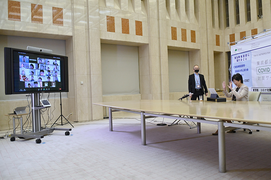 Image of the Governor on a video call