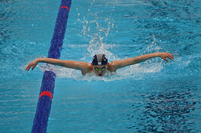 Photo: An athlete swimming in the pool