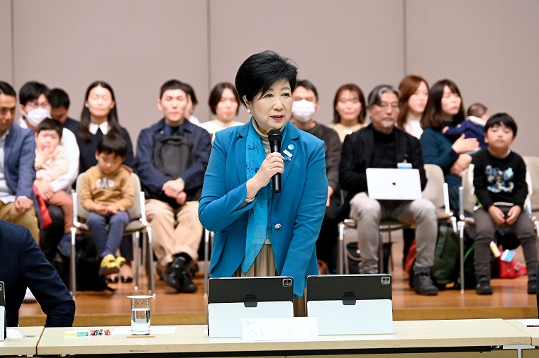 Photo: Governor Koike greeting the audience