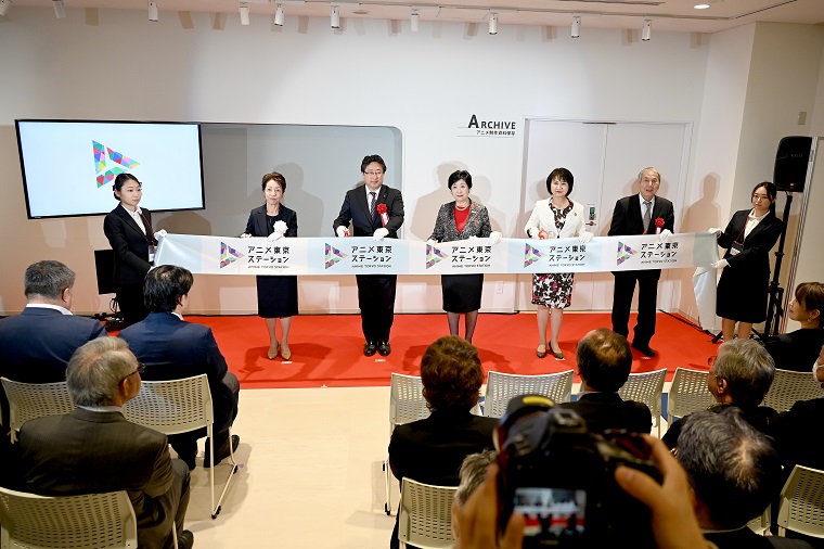 Photo: Ribbon cutting ceremony with Governor Koike and other attendees